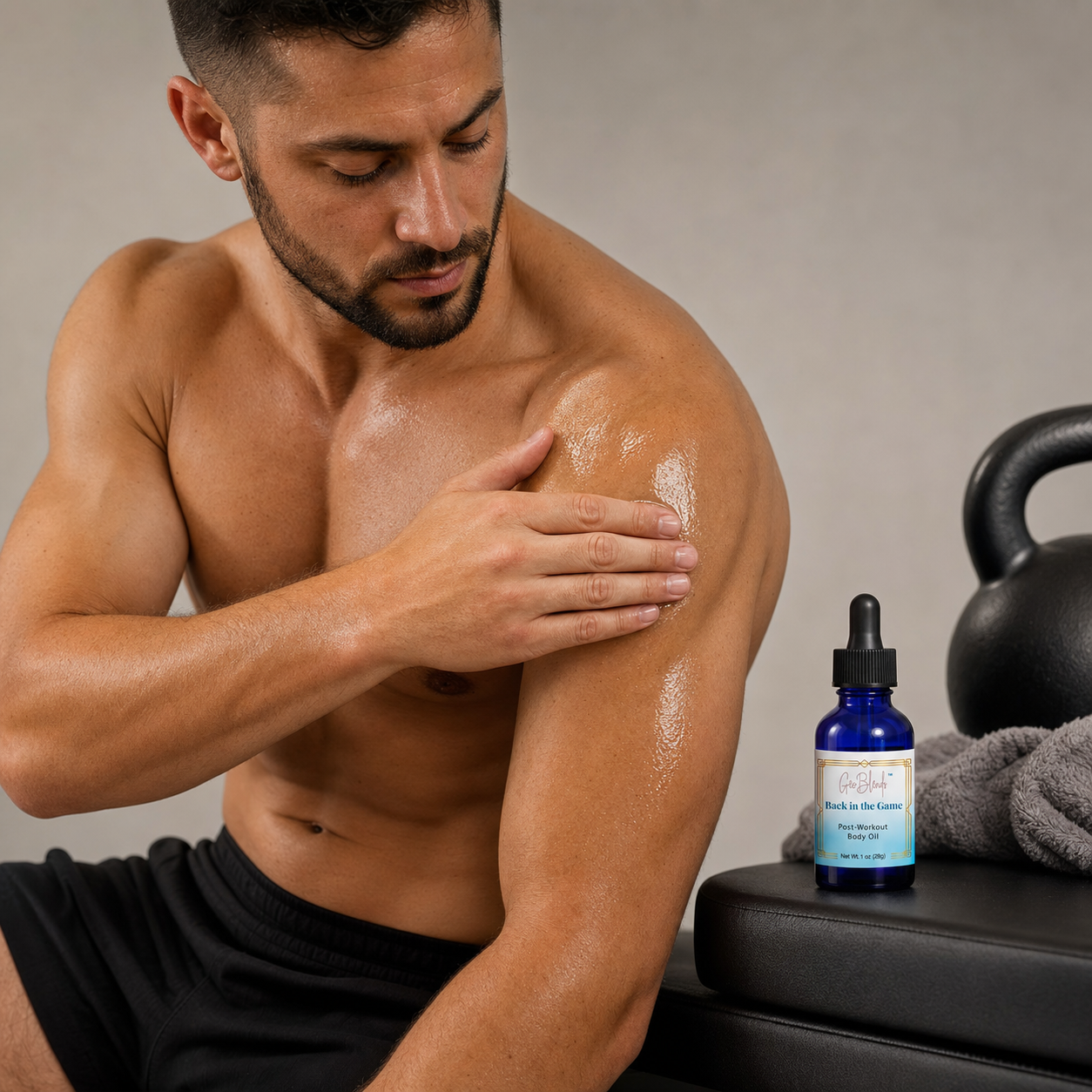 Man applying Back in the Game Post Workout Body Oil to his arm